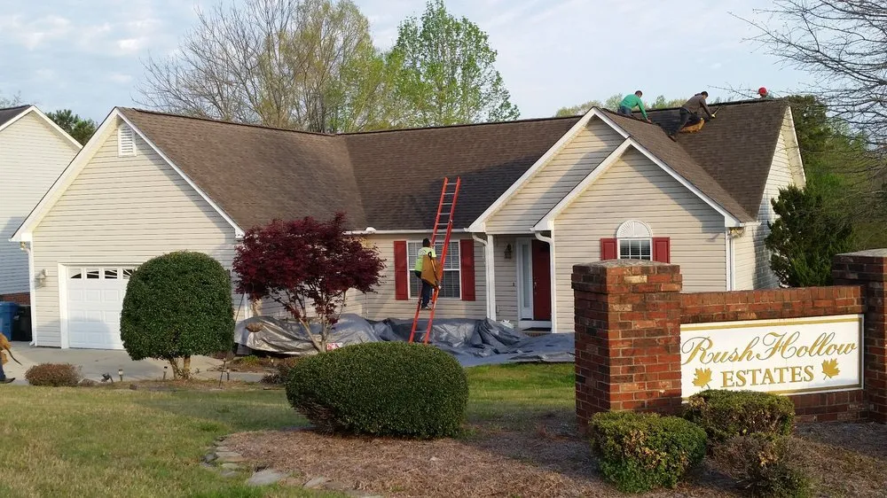 Slide of E & J Roofing