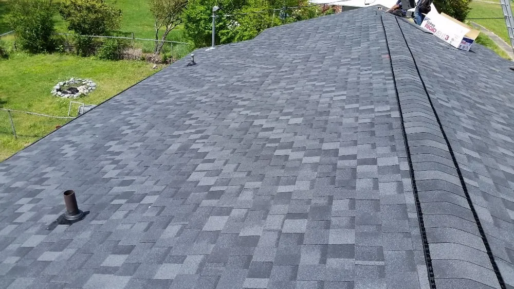 Slide of E & J Roofing