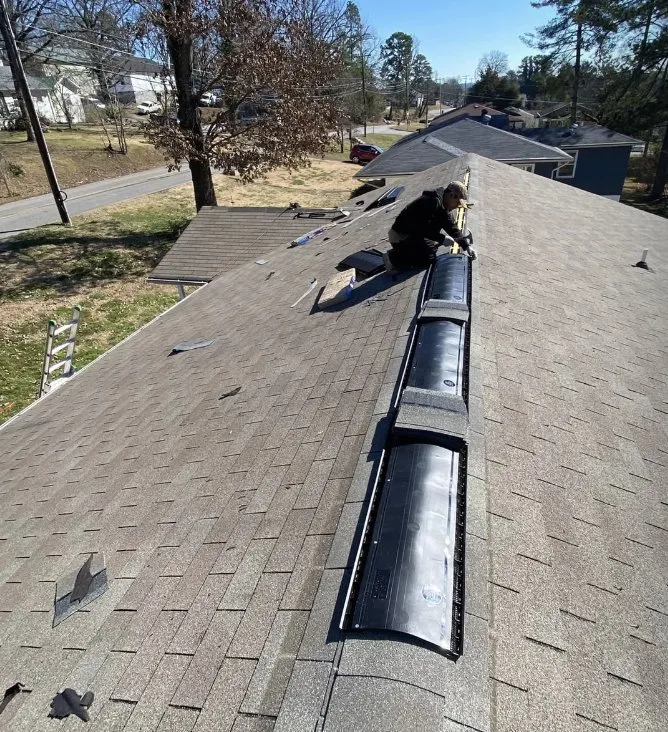 Slide of E & M Rooftop Solutions