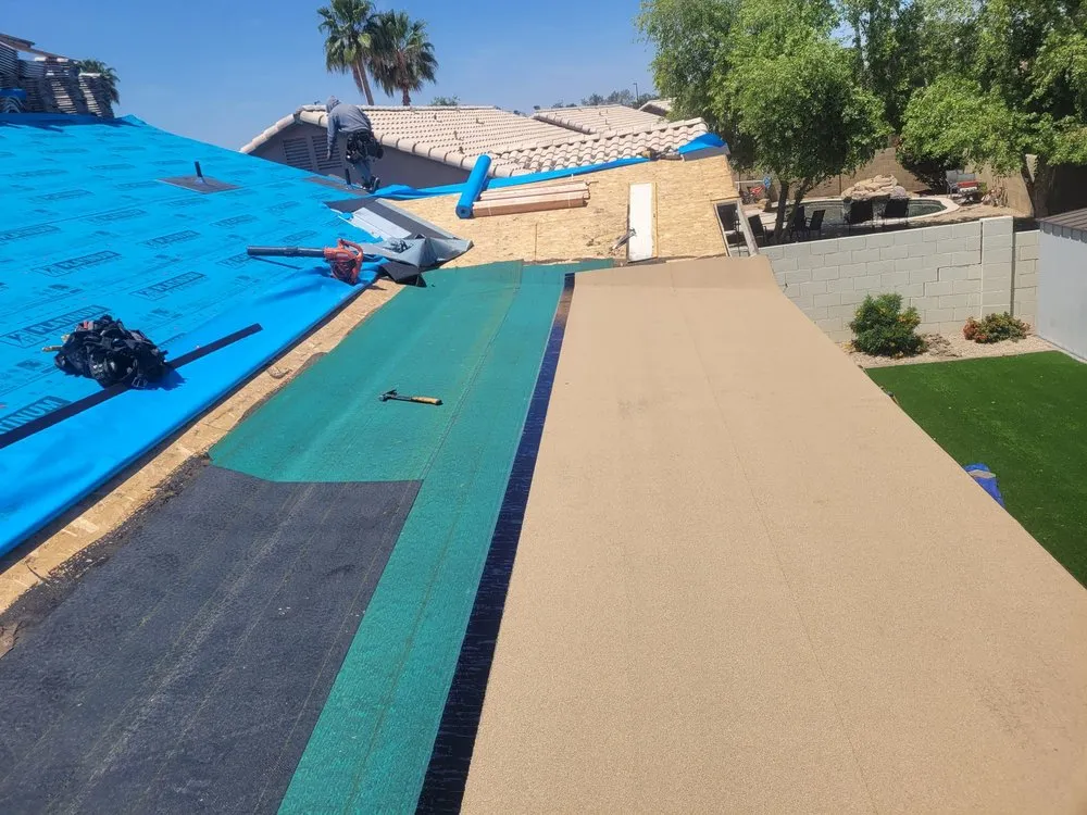 Slide of E & S Roofing