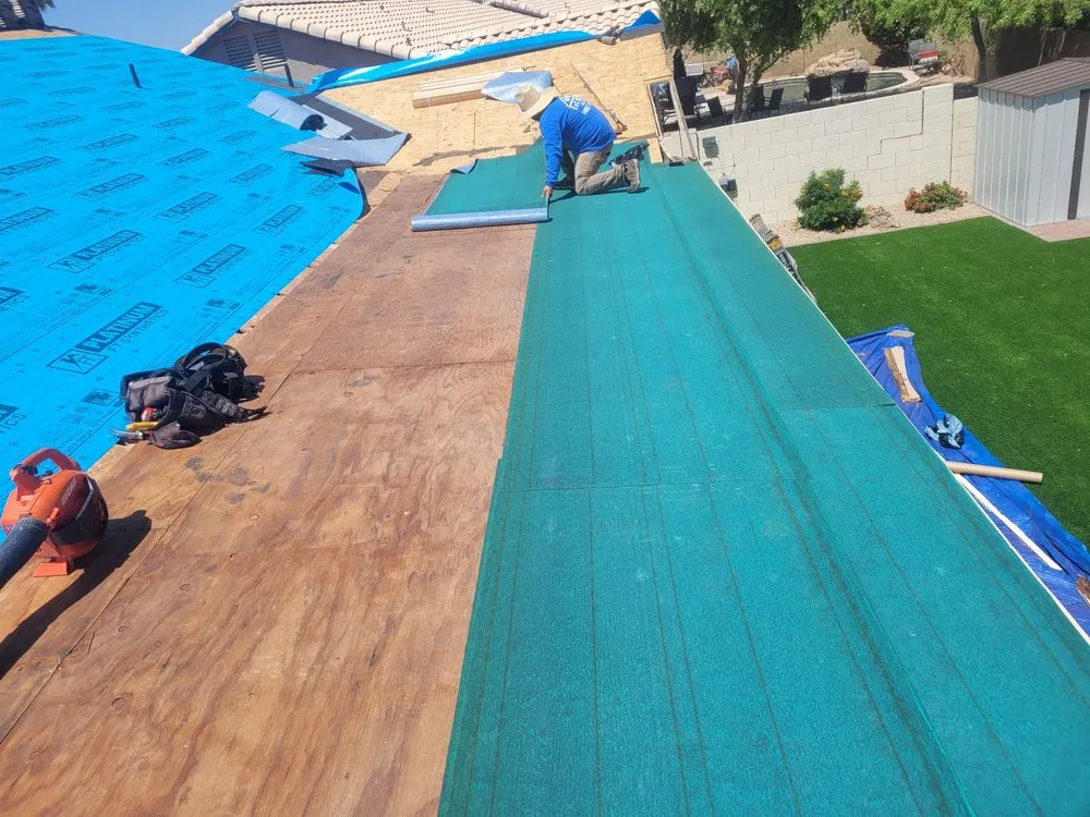 Slide of E & S Roofing