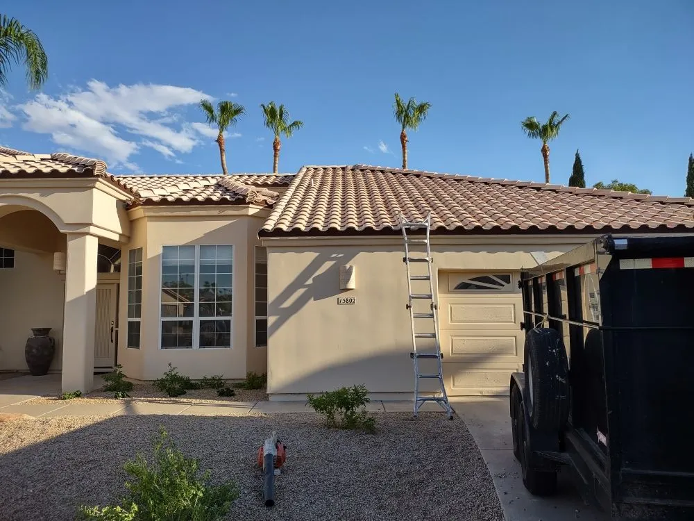 Slide of E & S Roofing