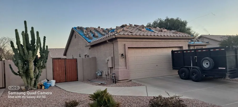 Slide of E & S Roofing