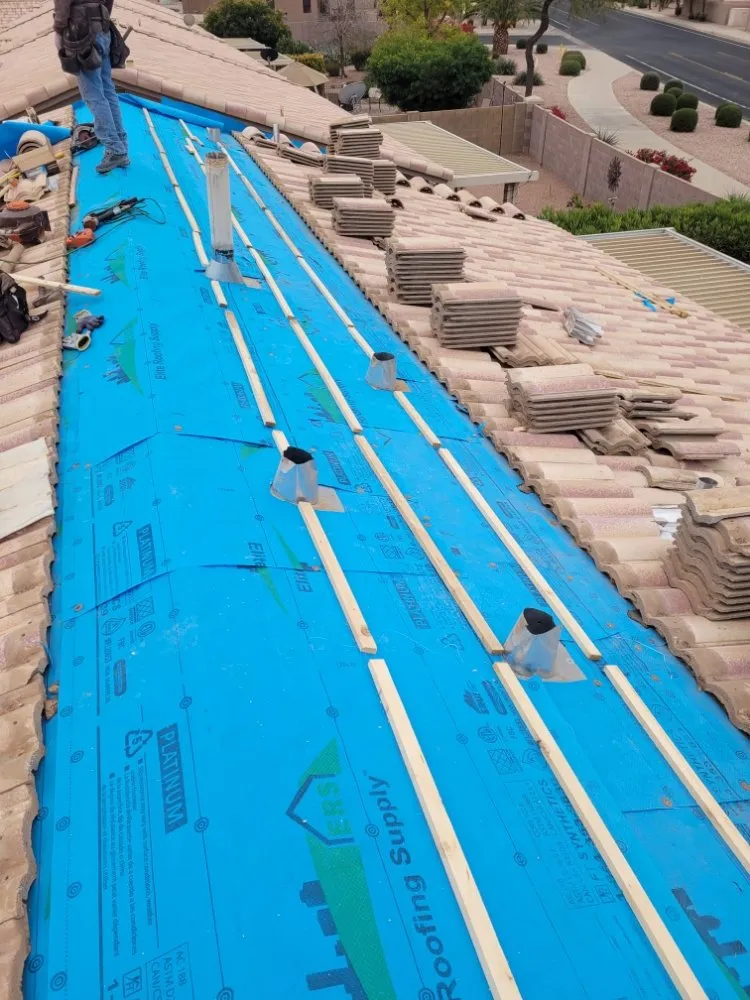 Slide of E & S Roofing