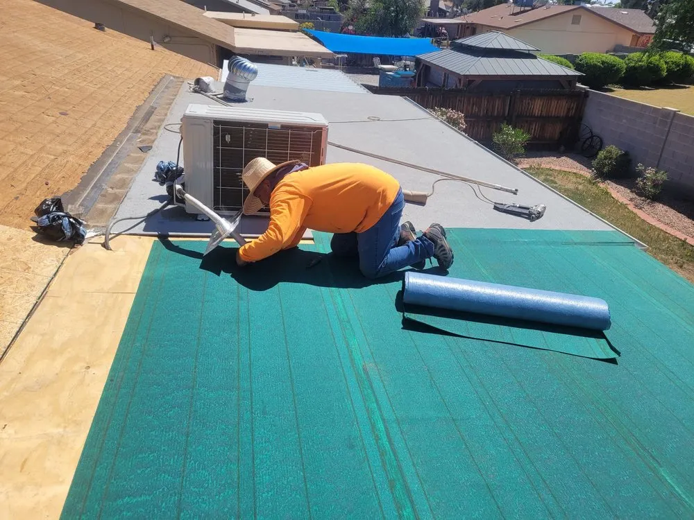 Slide of E & S Roofing