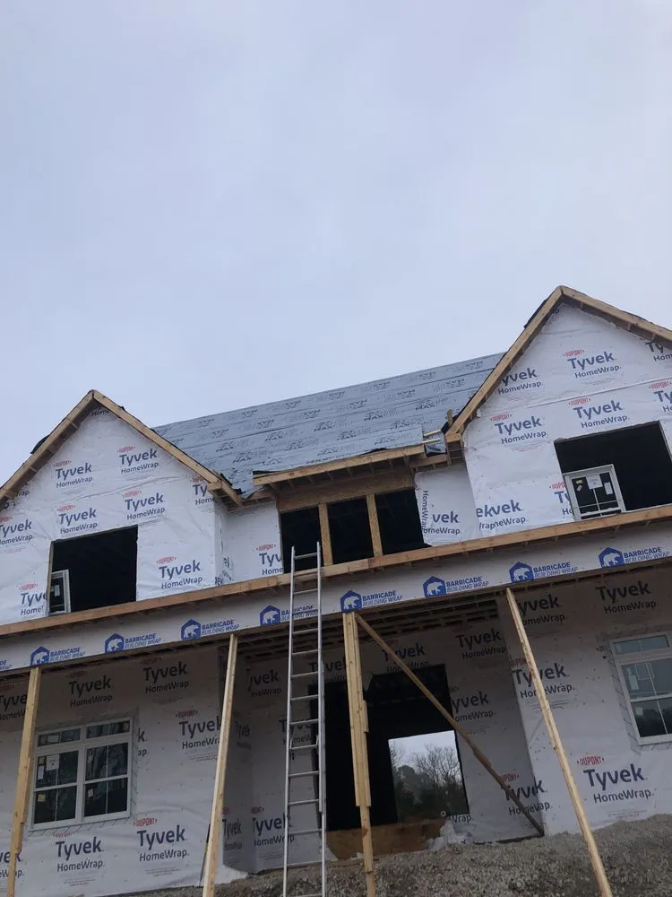 Slide of E & S Roofing