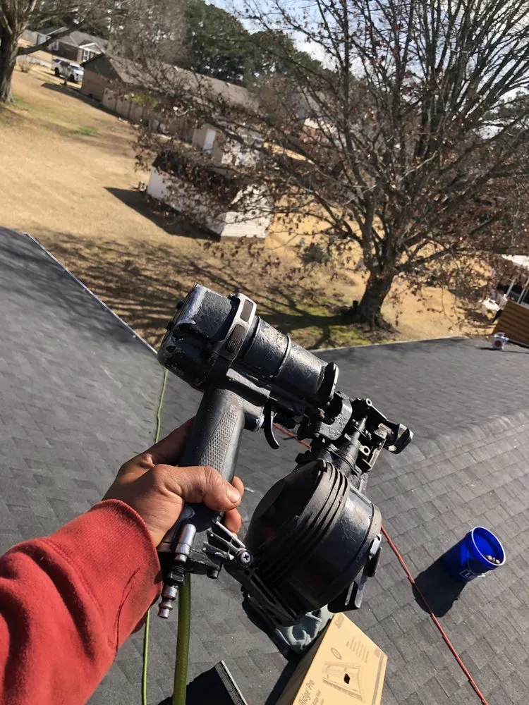 Slide of E & S Roofing