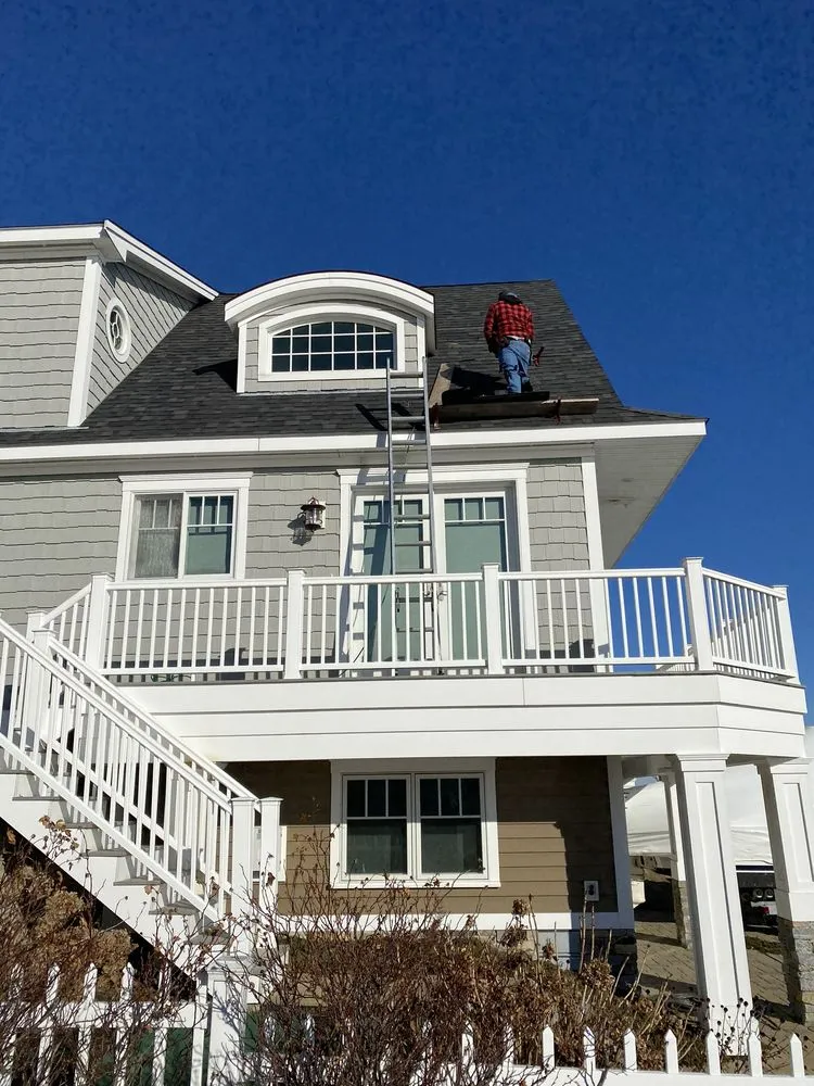 Slide of E & W Roofing and Construction