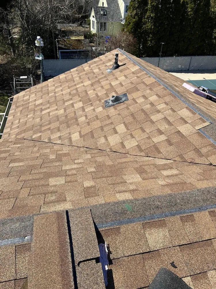 Slide of E & W Roofing and Construction