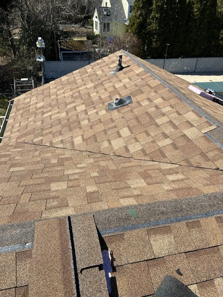 Slide of E & W Roofing and Construction