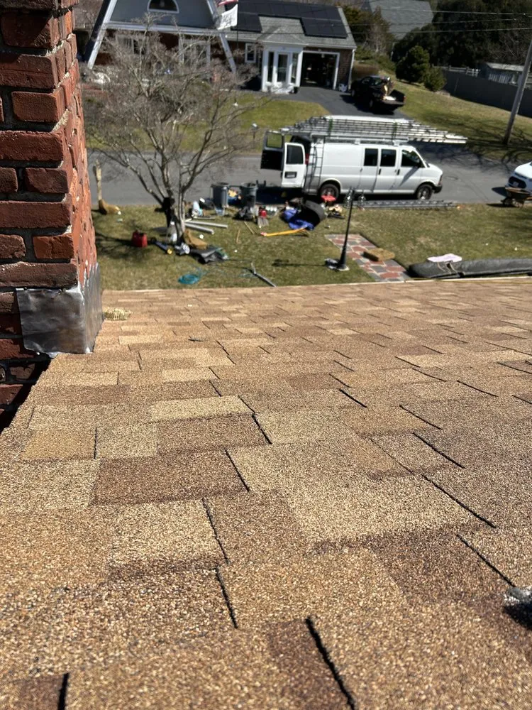 Slide of E & W Roofing and Construction