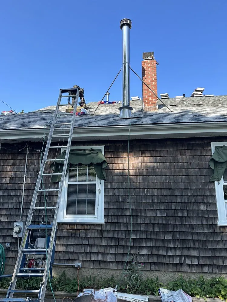 Slide of E & W Roofing and Construction