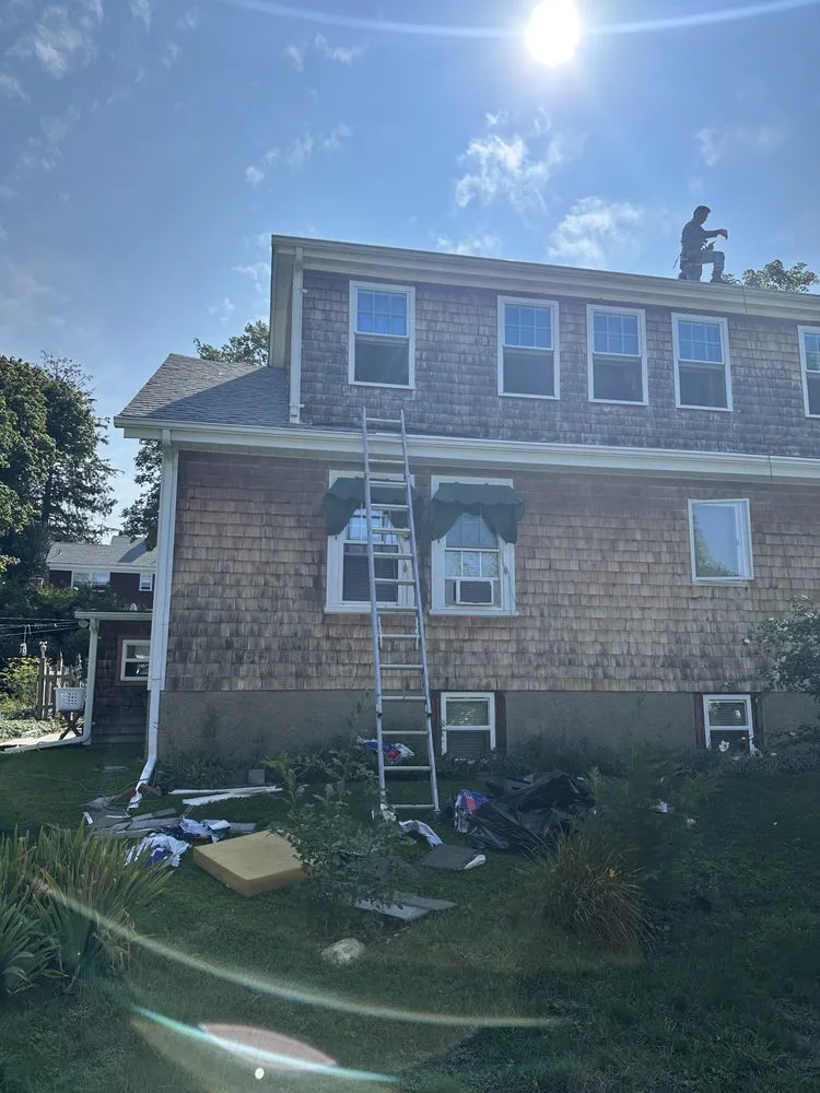 Slide of E & W Roofing and Construction