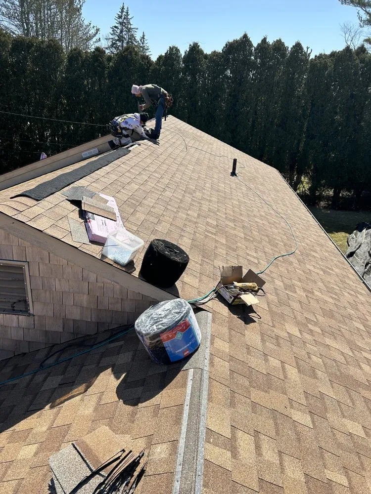 Slide of E & W Roofing and Construction