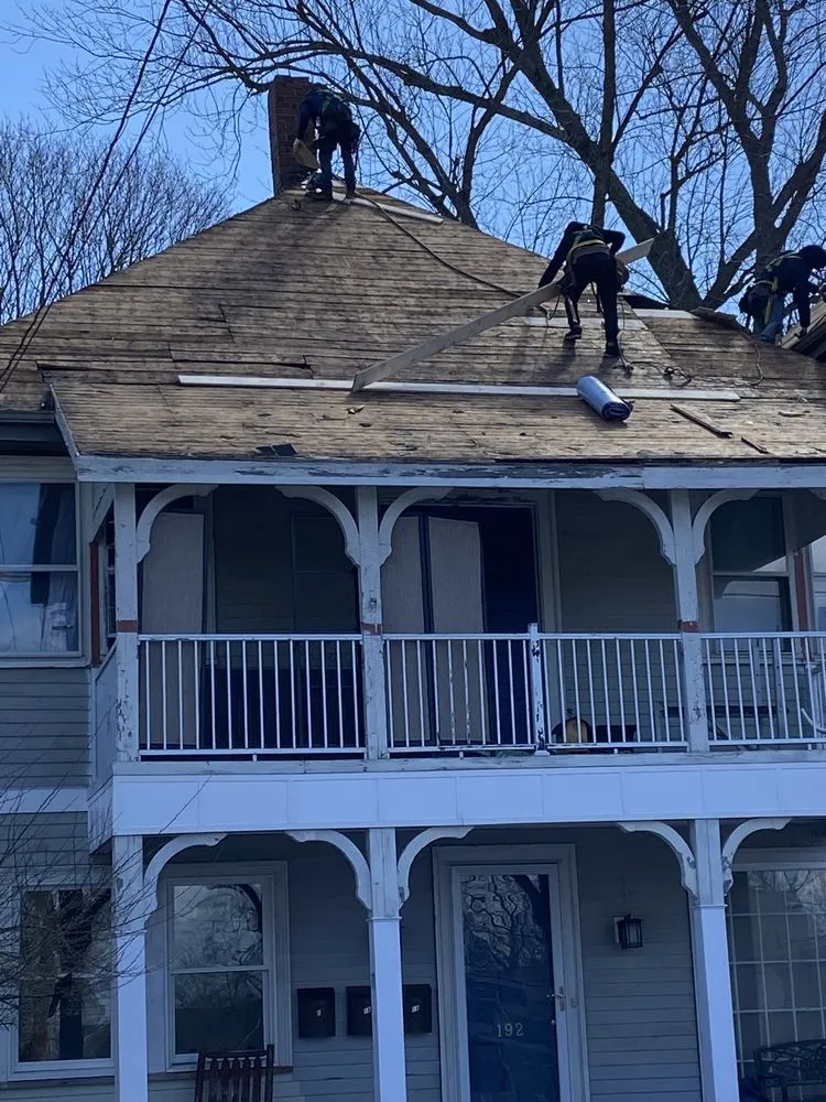 Slide of E & W Roofing and Construction