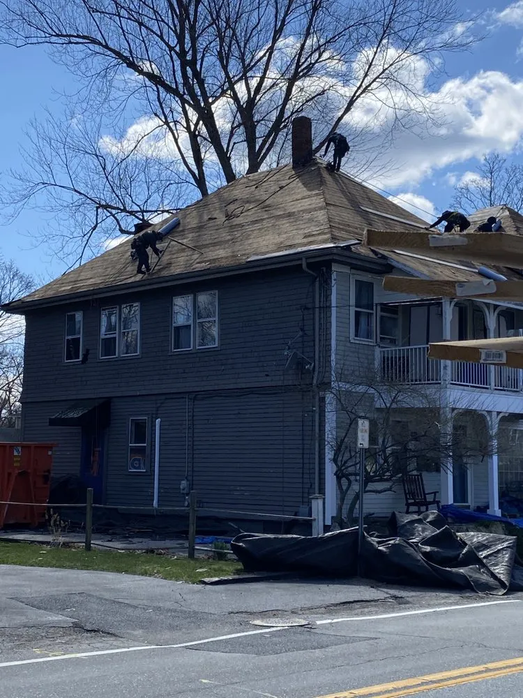 Slide of E & W Roofing and Construction