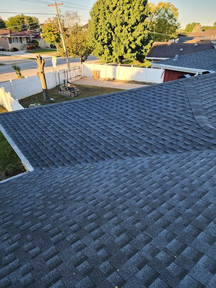 Slide of E And R Exterior Pros