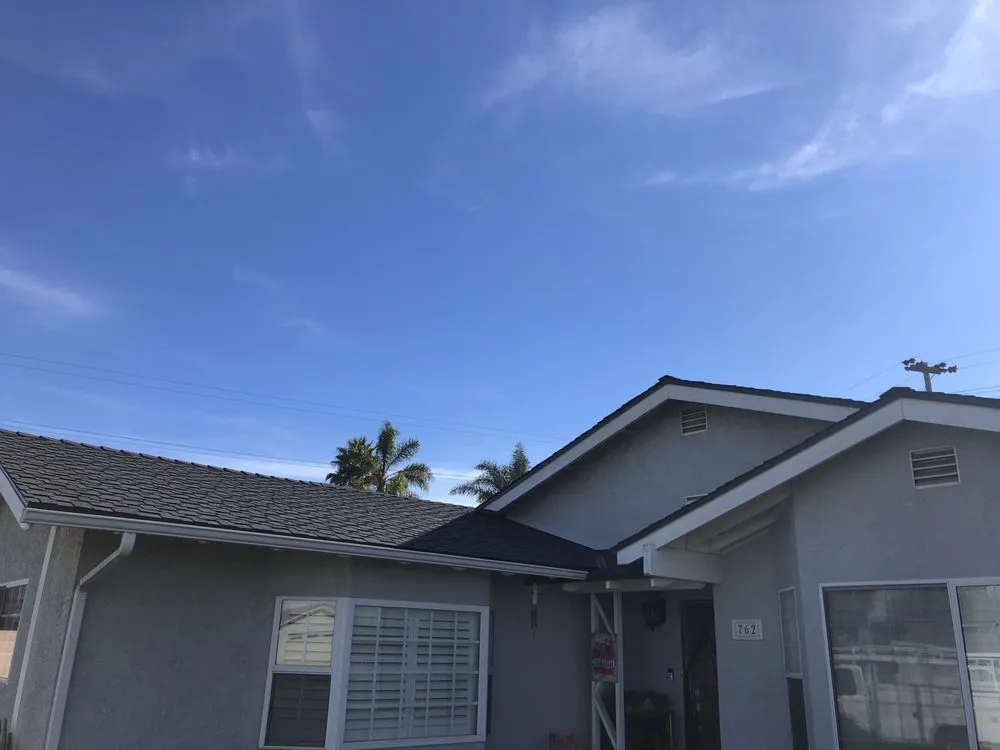 Slide of E And R Roofing