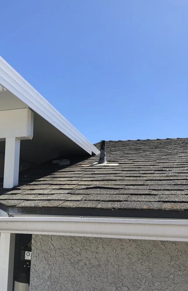 Slide of E And R Roofing