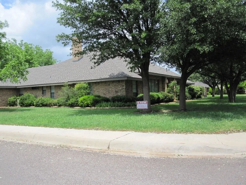 Slide of E E Roofing