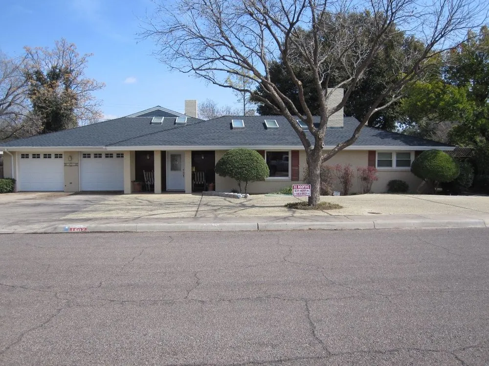 Slide of E E Roofing