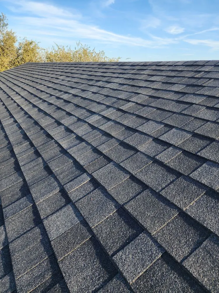 Slide of E E Roofing