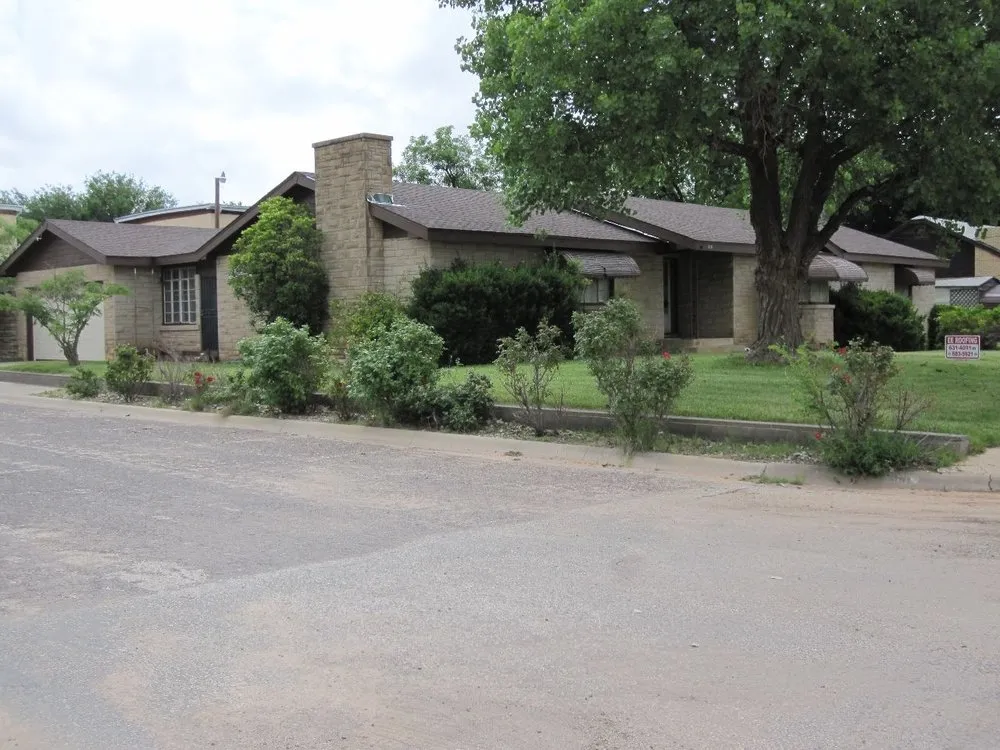 Slide of E E Roofing