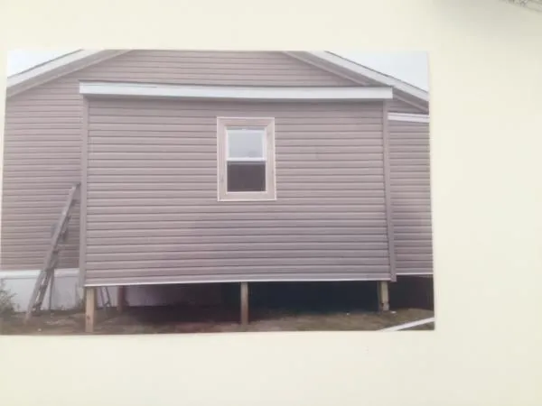 Slide of E Forrest Roofing and Painting