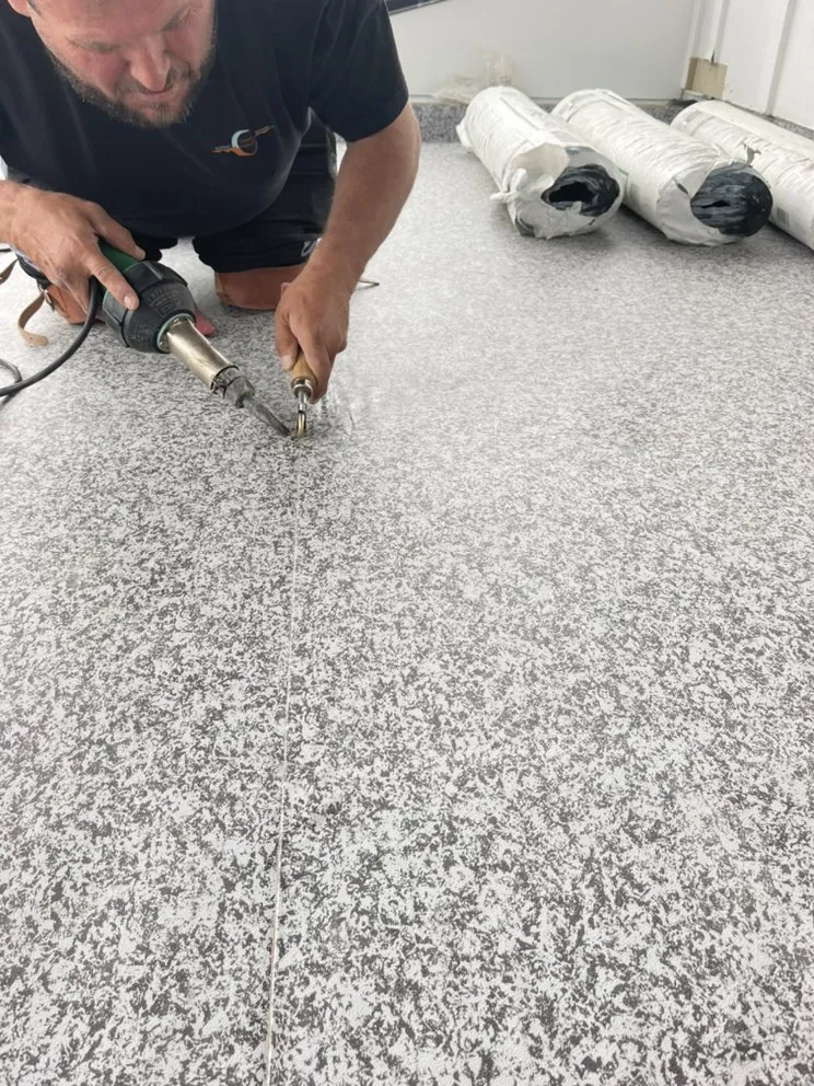 Slide of E j roofin contar