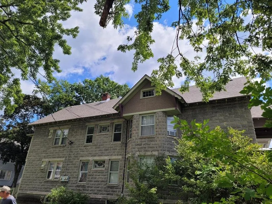 Slide of E-Mont Roofing