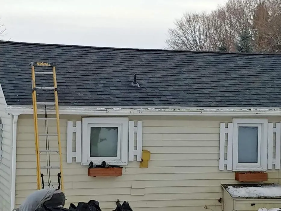 Slide of E-Mont Roofing