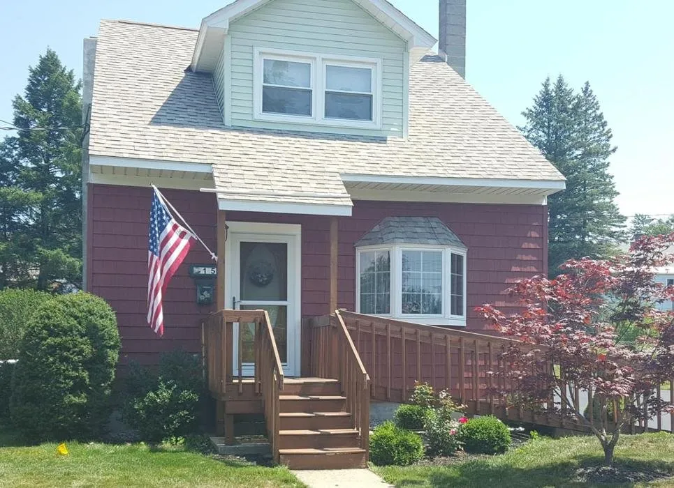 Slide of E-Mont Roofing