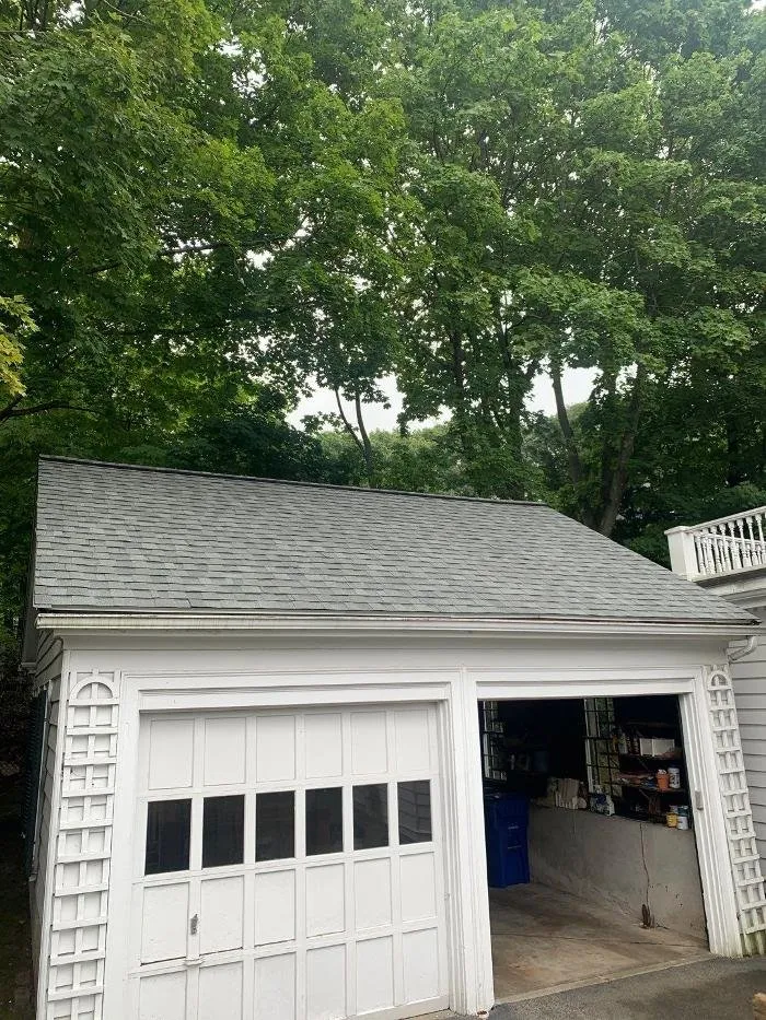 Slide of E-Mont Roofing