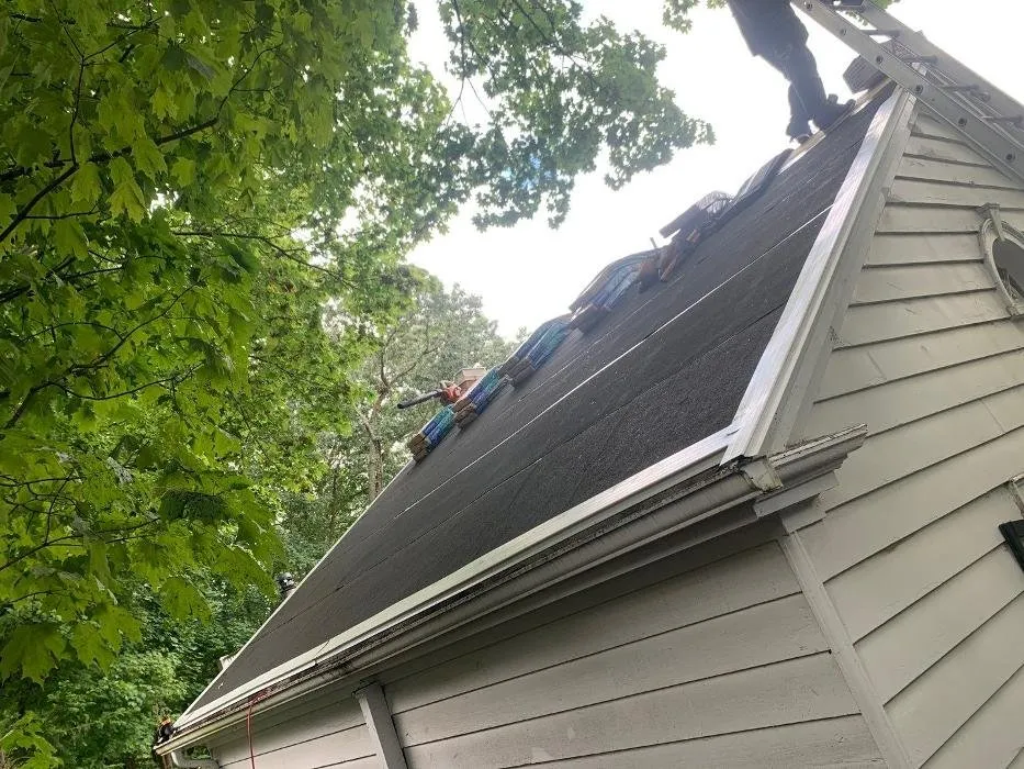 Slide of E-Mont Roofing