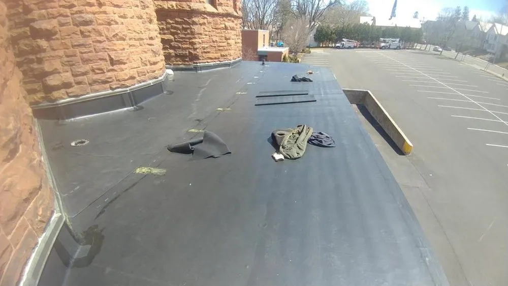 Slide of E-Mont Roofing