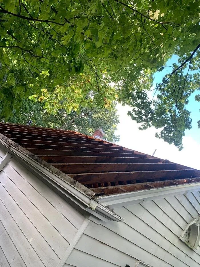 Slide of E-Mont Roofing