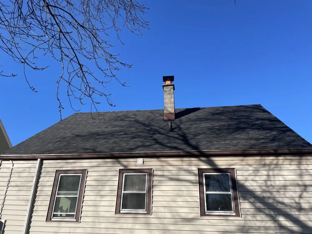 Slide of E S Roofing Services