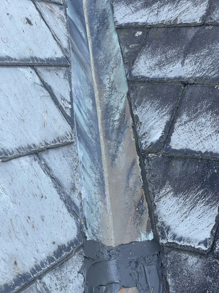 Slide of E S Roofing Services