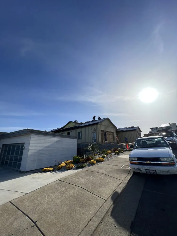 Slide of E Sanchez roofing