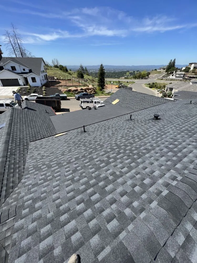 Slide of E Sanchez roofing