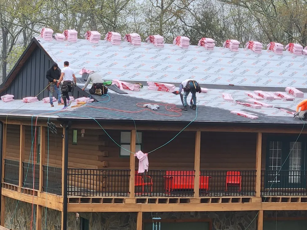 Slide of E. Thompson Roofing