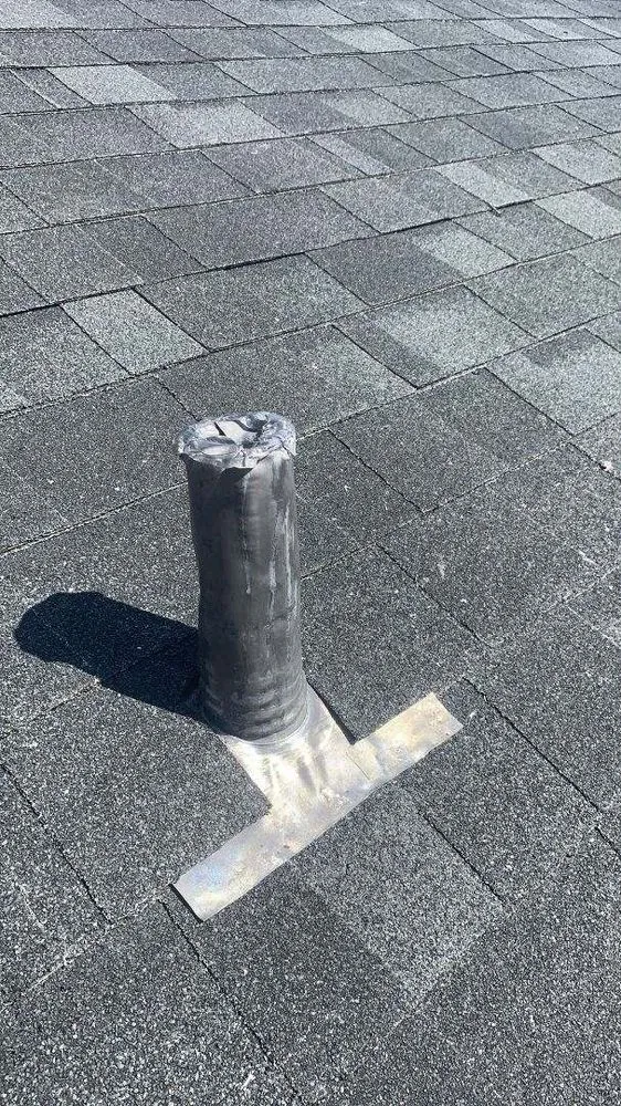 Slide of E. Thompson Roofing