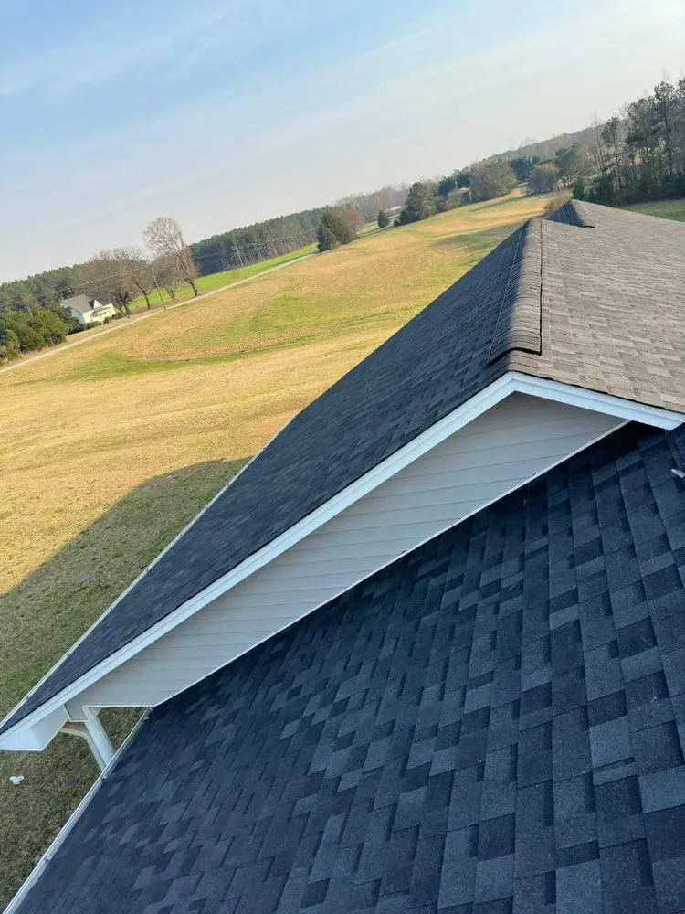 Slide of E. Thompson Roofing