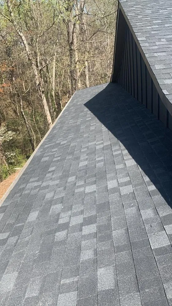 Slide of E. Thompson Roofing