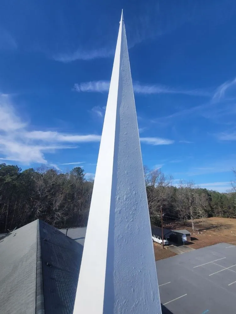 Slide of E. Thompson Roofing