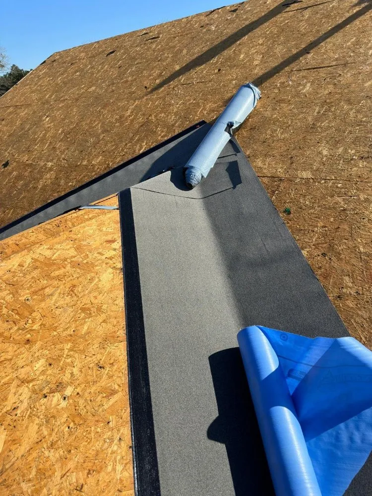 Slide of E. Thompson Roofing