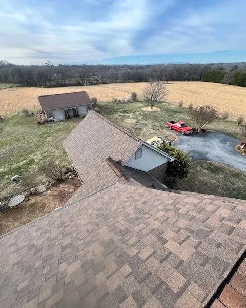 Slide of E. Thompson Roofing