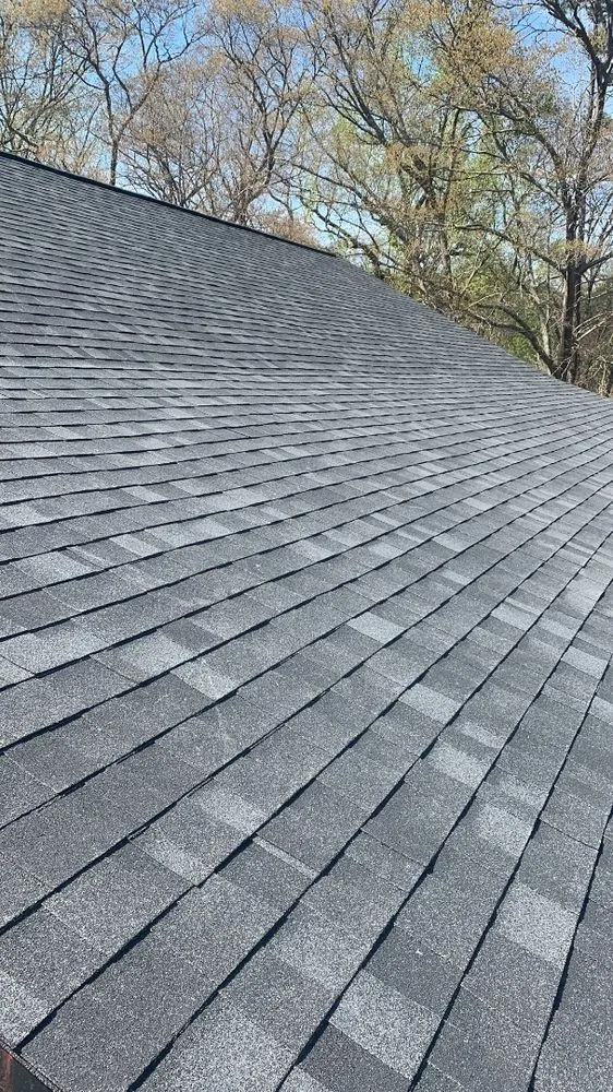 Slide of E. Thompson Roofing