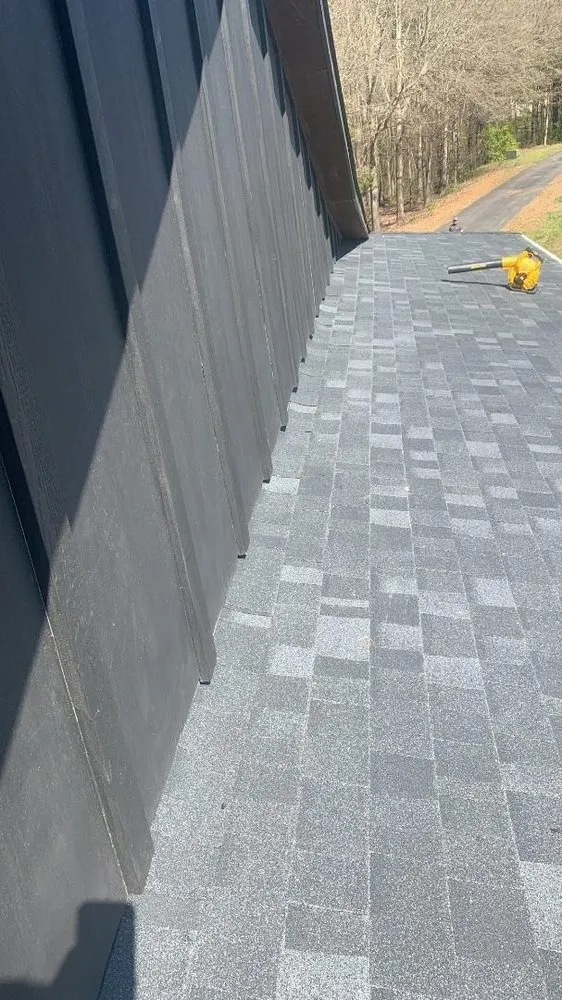 Slide of E. Thompson Roofing