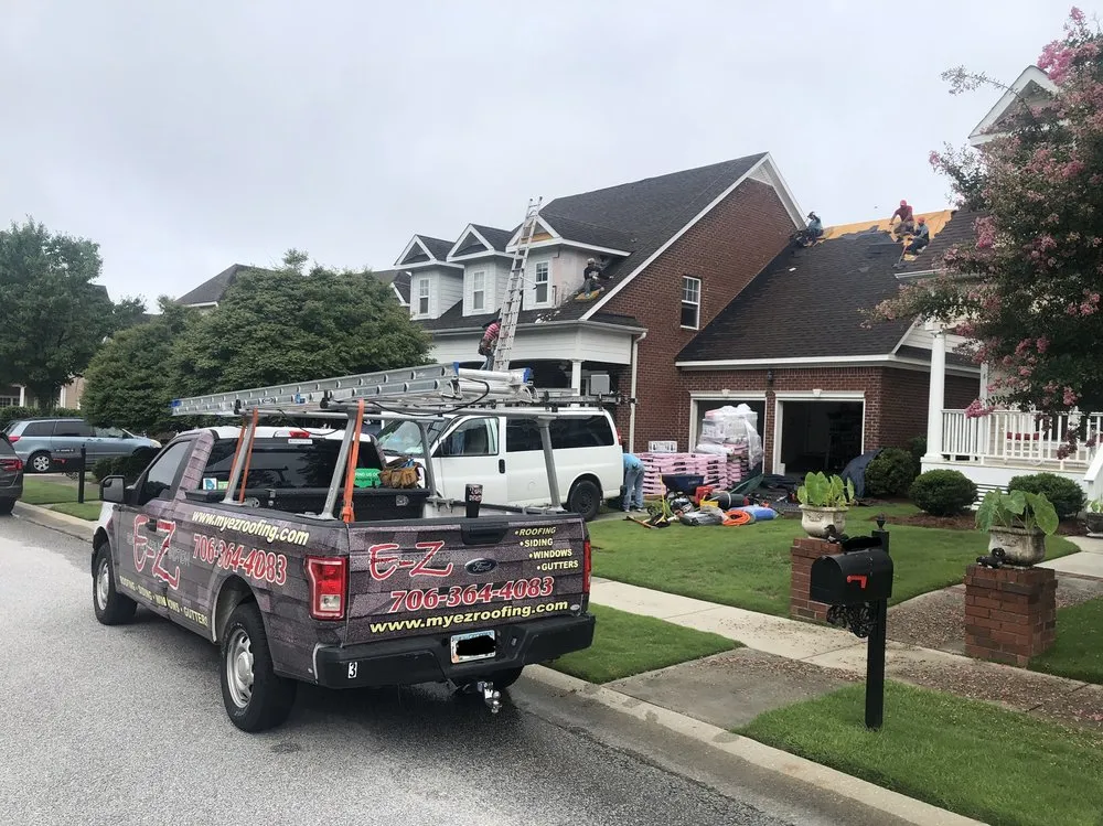 Slide of E-Z Roofing & Construction